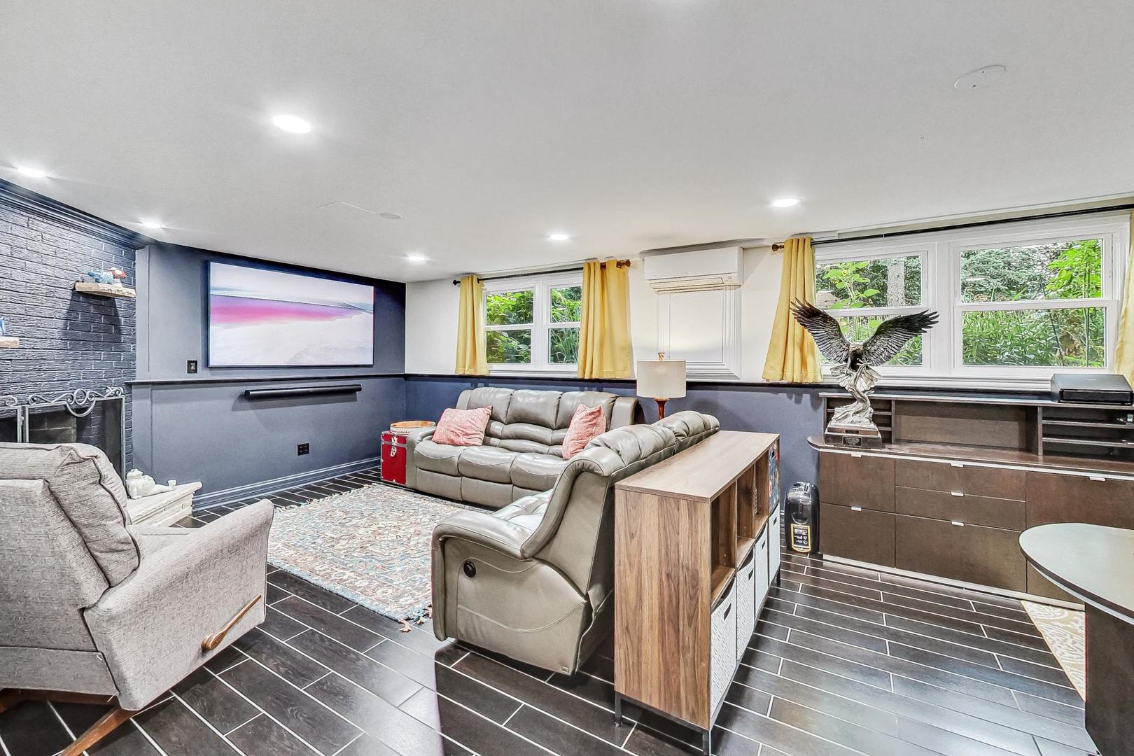 1314 Tyrell Avenue Park Ridge, IL 60068 - Photo 16 of 25 a living room with furniture and a flat screen tv
