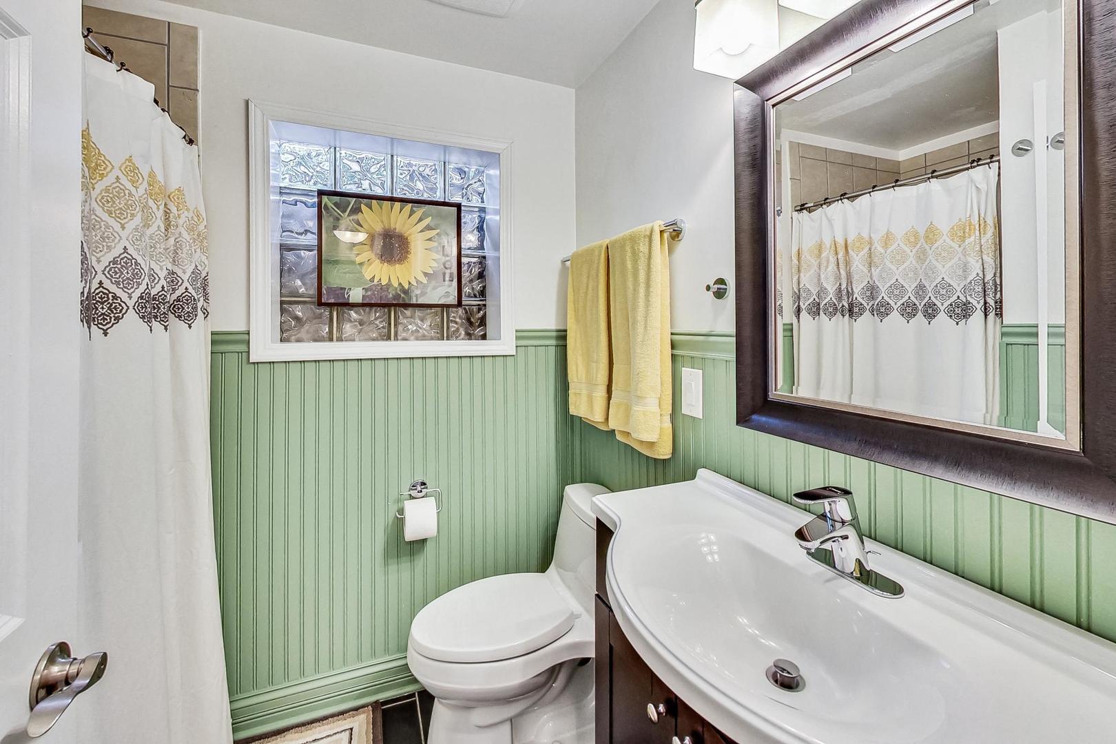 1314 Tyrell Avenue Park Ridge, IL 60068 - Photo 19 of 25 a bathroom with a sink mirror and toilet