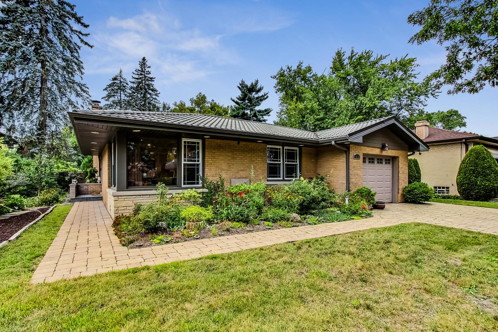 1314 Tyrell Avenue Park Ridge, IL 60068 - Photo 2 of 25 front view of house with a yard