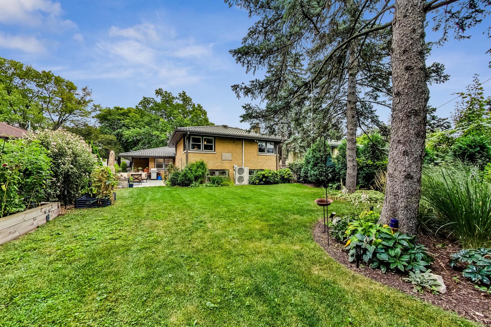 1314 Tyrell Avenue Park Ridge, IL 60068 - Photo 24 of 25 a front view of a house with a yard