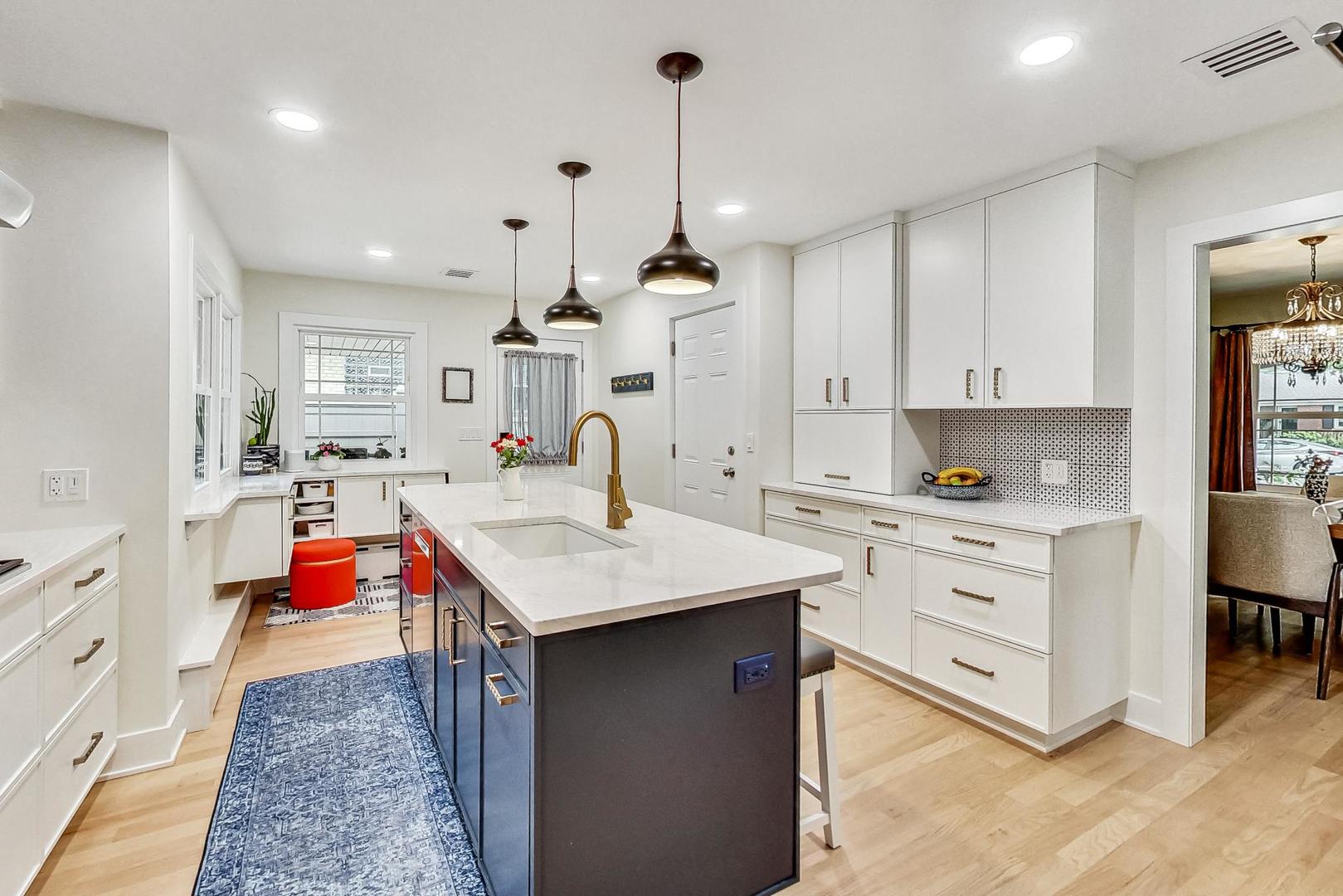 1314 Tyrell Avenue Park Ridge, IL 60068 - Photo 9 of 25 a very nice looking kitchen with granite countertop a sink stainless steel appliances and cabinets