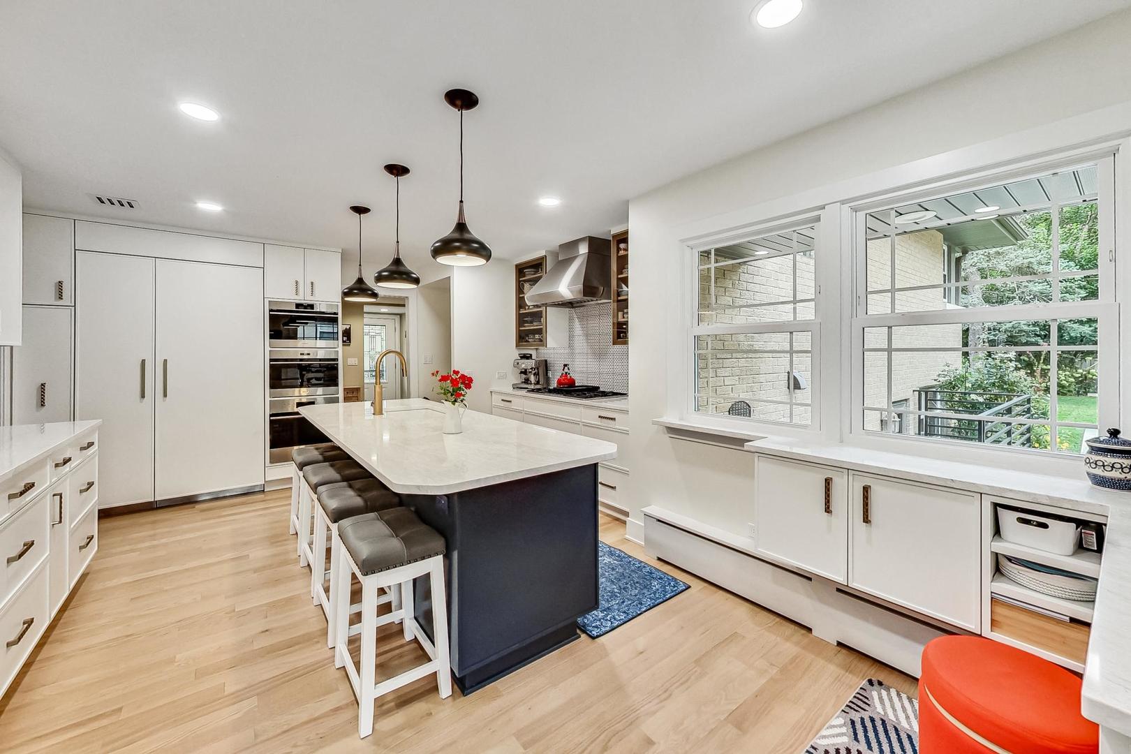1314 Tyrell Avenue Park Ridge, IL 60068 - Photo 10 of 25 a kitchen with stainless steel appliances granite countertop a sink a stove and a refrigerator