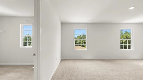 an empty room with windows