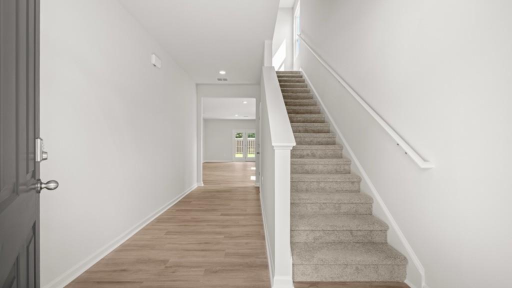 35 Coggins Place Northeast Rome, GA 30165 - Photo 2 of 28 a view of a hallway with wooden floor and entryway
