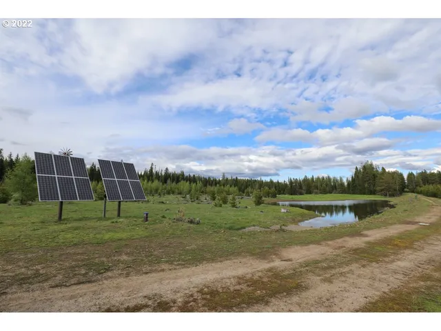 a view of a golf course with a lake