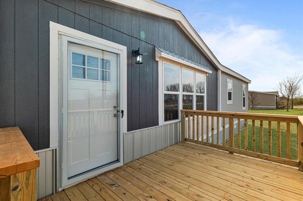3888 Sandusky Road Whitesboro, TX 76273 - Photo 5 of 39 View of wooden deck