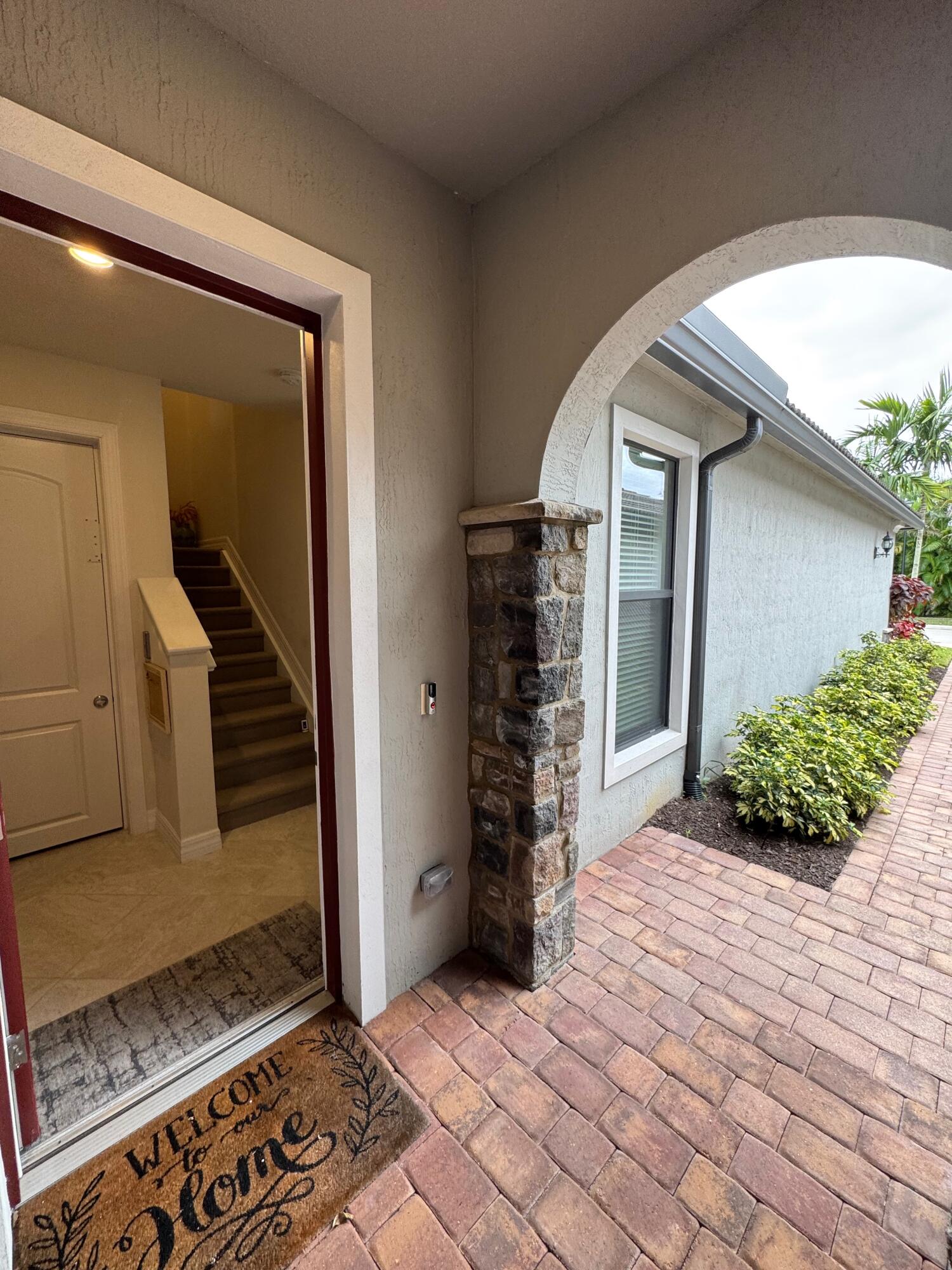 21872 Canadensis Circle, Unit 202 Boca Raton, FL 33428 - Photo 4 of 43 entrance walkway
