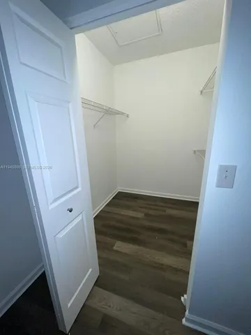a view of storage and utility room with empty racks