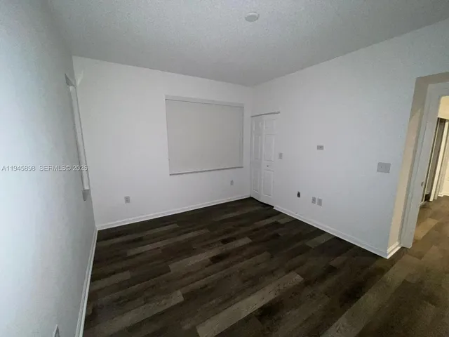 a view of small space with wooden floor