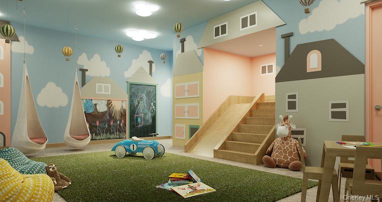 3 Court Square, Unit 704 Queens, NY 11101 - Photo 7 of 14 a bed sitting in a bedroom next to a window