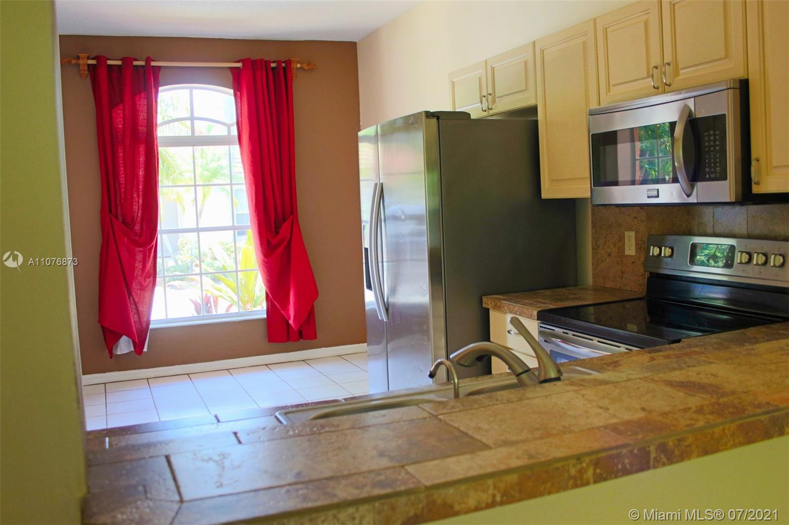 3118 Contego Lane Riviera Beach, FL 33418 - Photo 6 of 24
