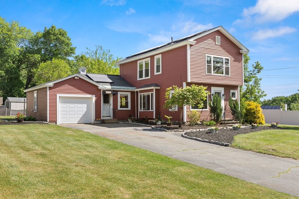 3 Scotland Heights Road Haverhill, MA 01832 - Photo 1 of 36 a front view of a house with yard and trees in the background