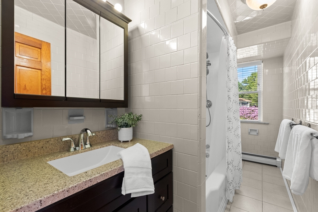 3 Scotland Heights Road Haverhill, MA 01832 - Photo 23 of 36 a bathroom with a granite countertop sink and a mirror