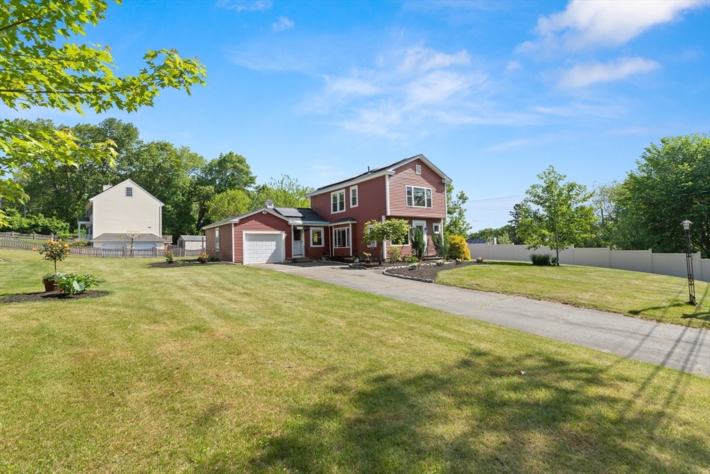 3 Scotland Heights Road Haverhill, MA 01832 - Photo 33 of 36 a front view of house with yard and trees in the background
