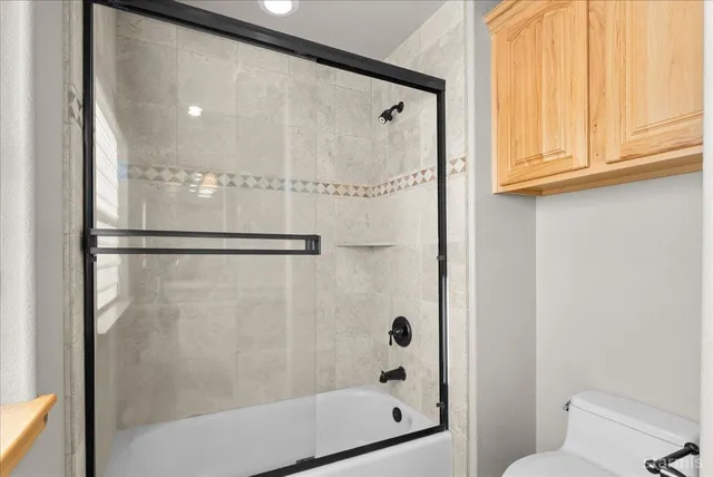 a room with furniture and a rug