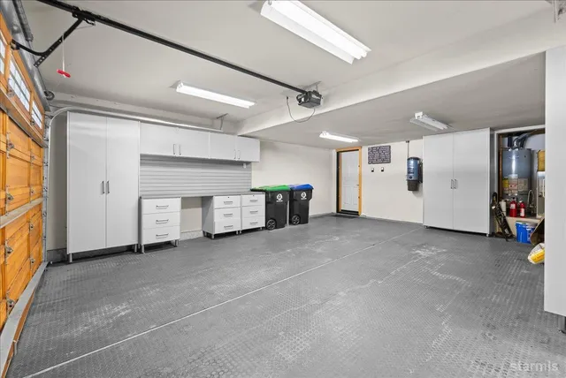 a view of staircase with railing and trees