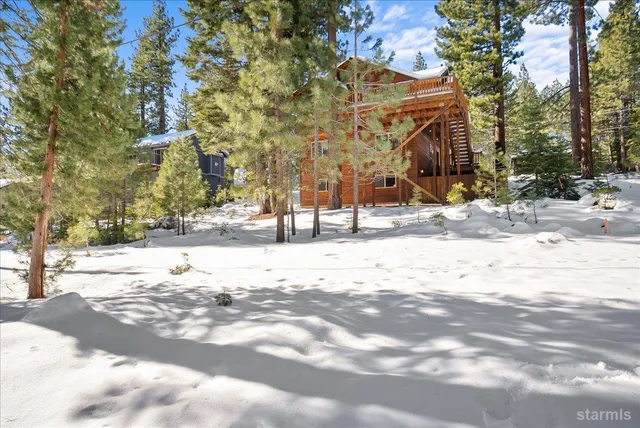 a view of road and trees