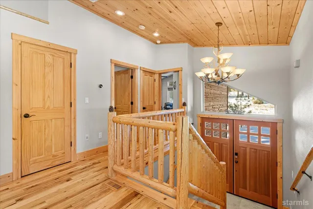 a view of a balcony with chandelier