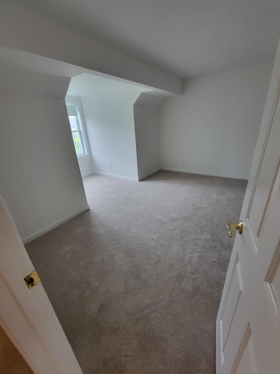 281 Rowley Bridge Road, Unit 7 Topsfield, MA 01983 - Photo 14 of 32 a view of a garage