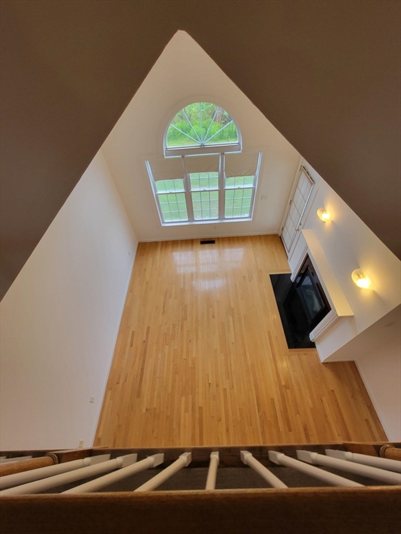 281 Rowley Bridge Road, Unit 7 Topsfield, MA 01983 - Photo 24 of 32 a room with pool table and a floor to ceiling window