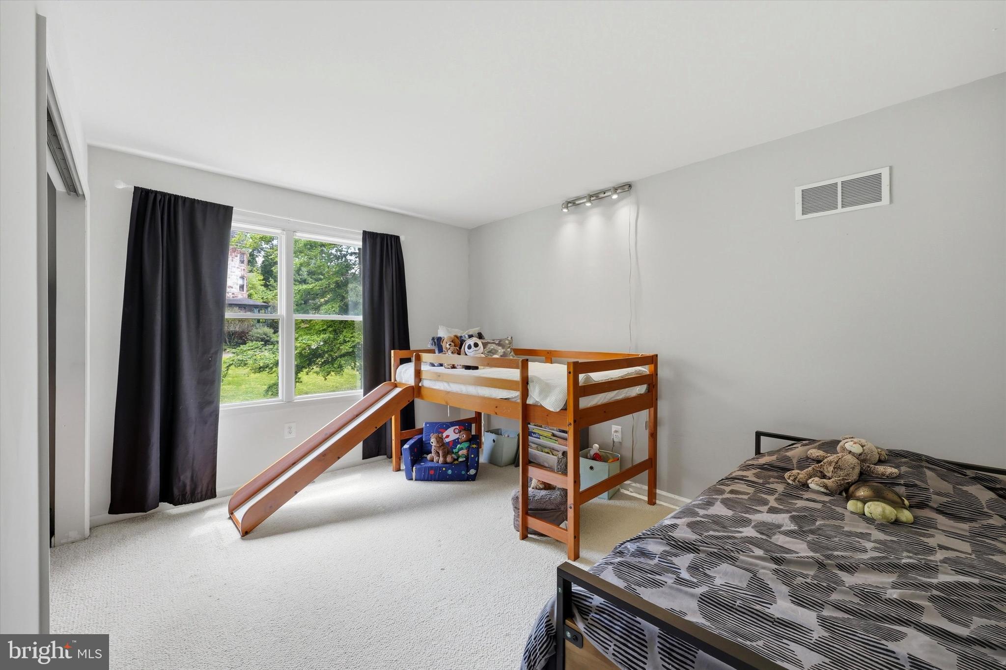 320 Maple Avenue Wyncote, PA 19095 - Photo 16 of 28 a bedroom with a bed and a window