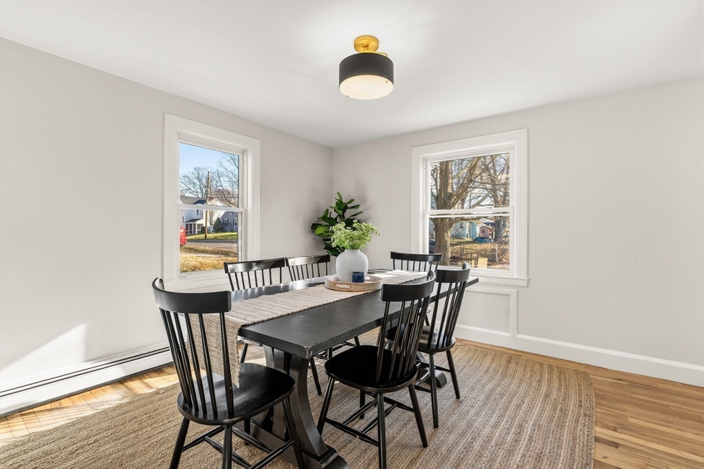 74 Magnolia Street Braintree, MA 02184 - Photo 16 of 35 a view of a dining room with furniture and window