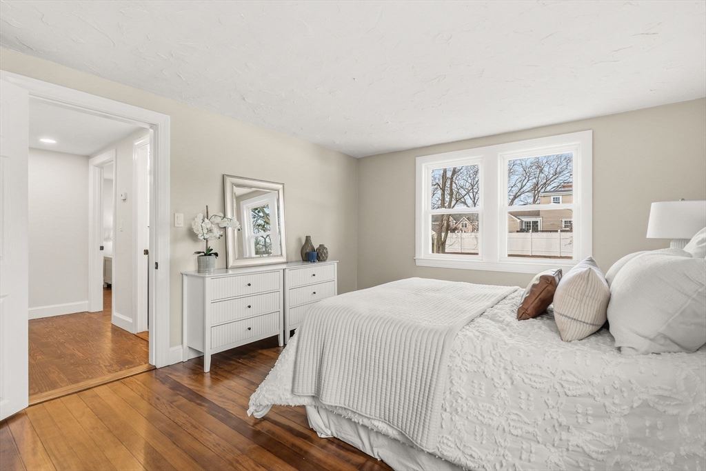 74 Magnolia Street Braintree, MA 02184 - Photo 22 of 35 a bedroom with a bed and a window