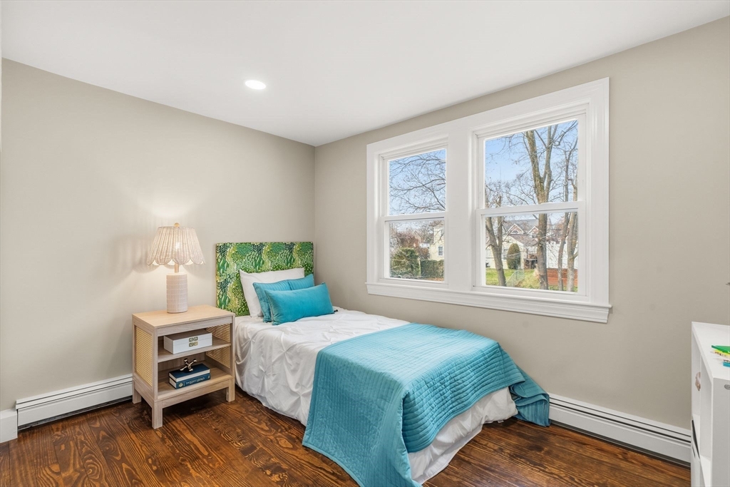 74 Magnolia Street Braintree, MA 02184 - Photo 25 of 35 a bedroom with a bed and a window