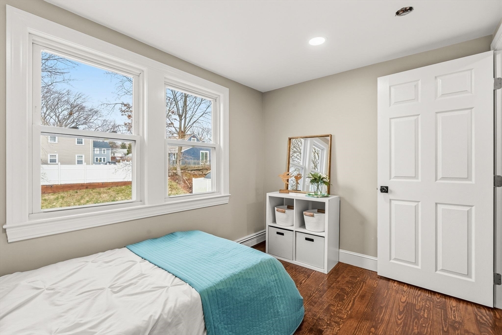 74 Magnolia Street Braintree, MA 02184 - Photo 26 of 35 a bedroom with a bed and a window