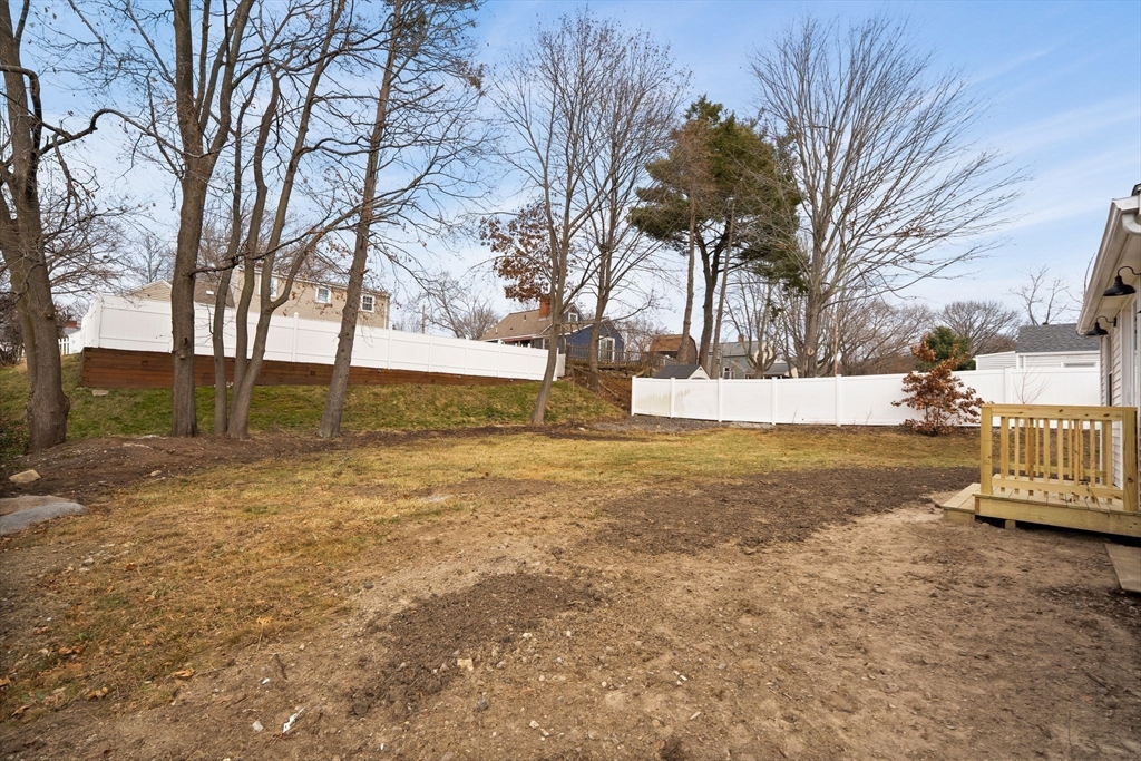 74 Magnolia Street Braintree, MA 02184 - Photo 31 of 35 a view of yard with trees