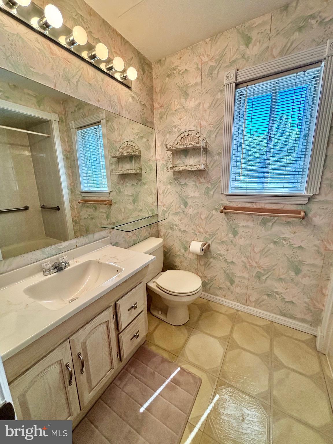 20 Bock Boulevard Howell, NJ 07731 - Photo 22 of 32 a bathroom with a sink a toilet and shower