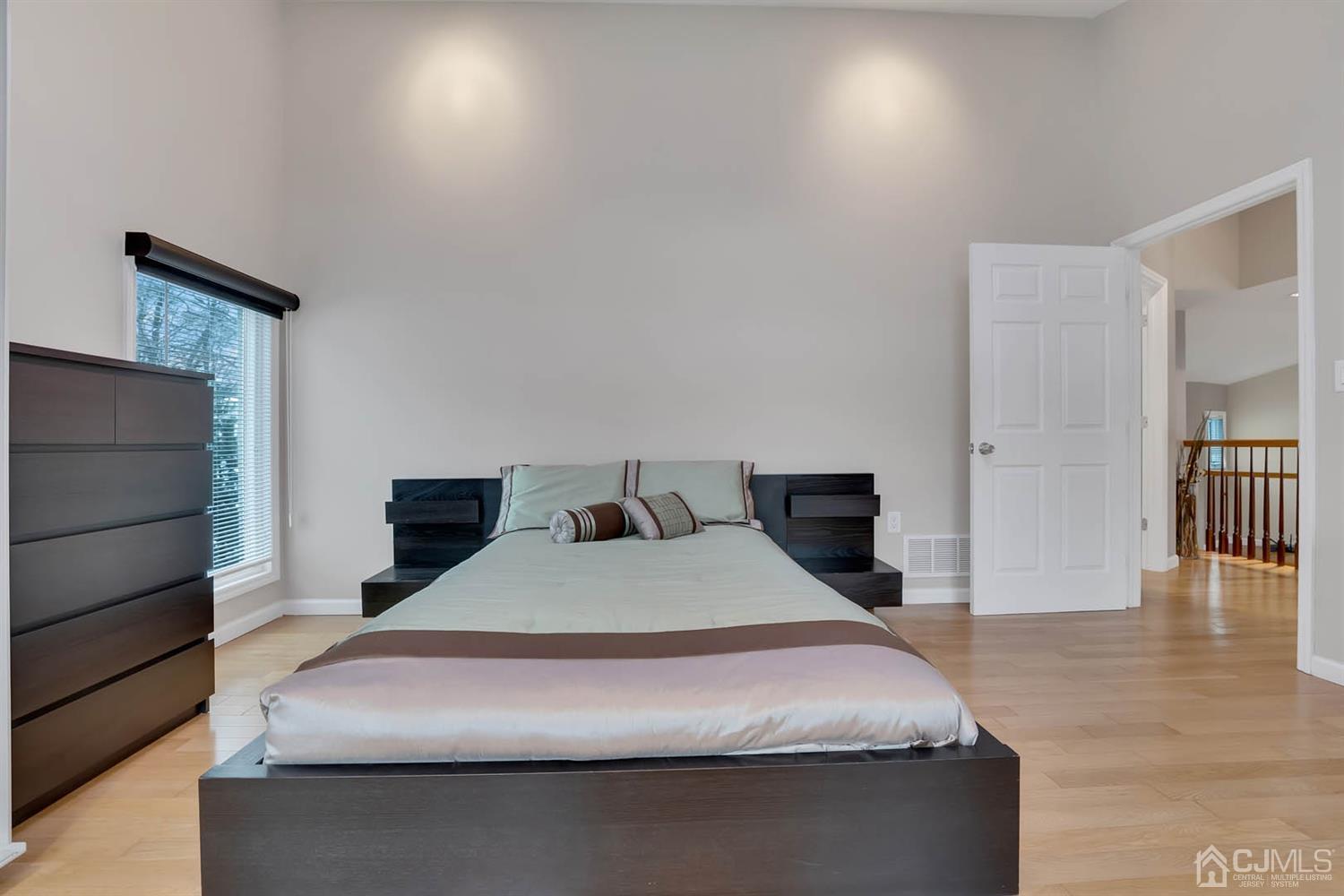 3032 Cheesequake Road Old Bridge, NJ 08859 - Photo 18 of 28 a bedroom with a bed and a table