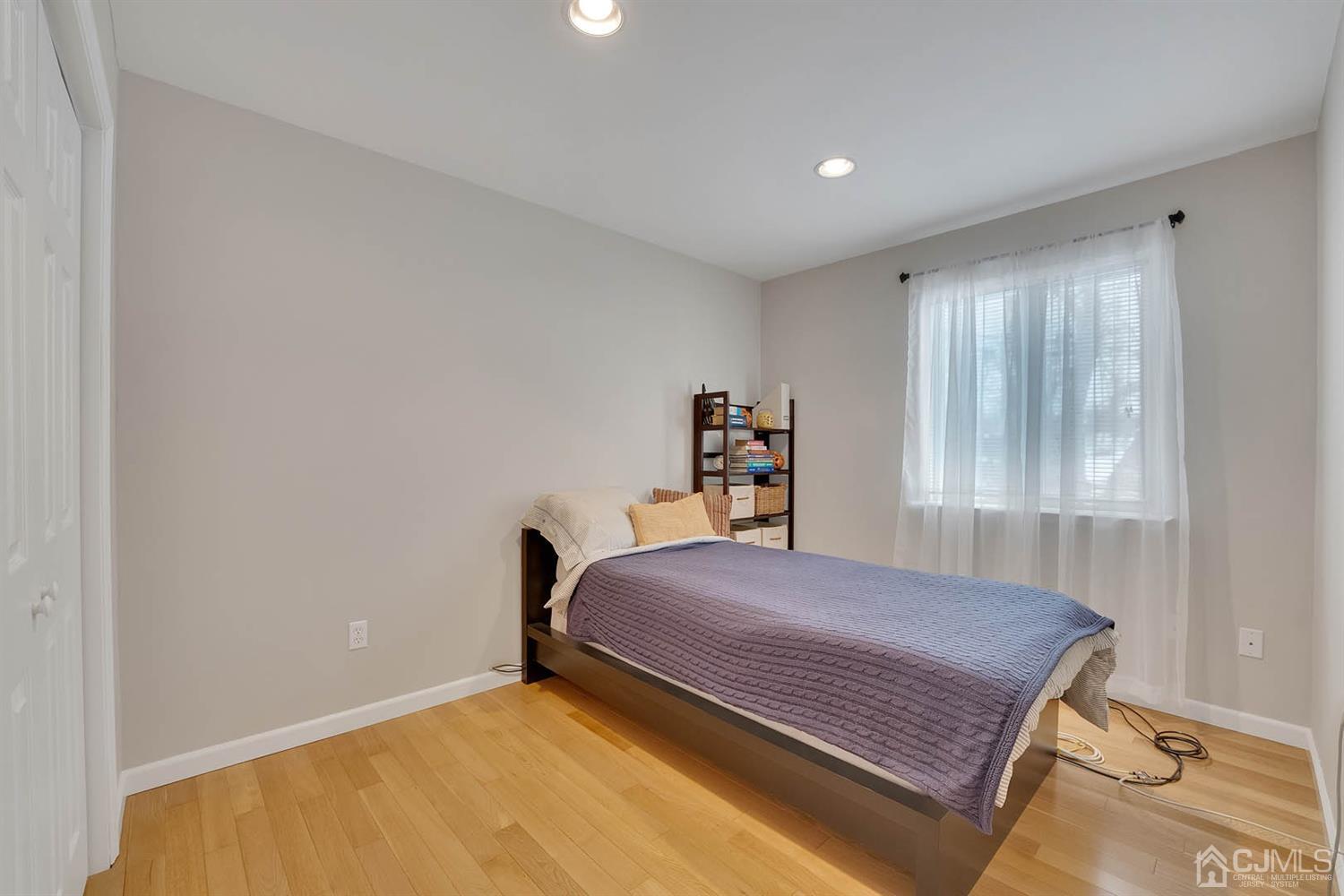 3032 Cheesequake Road Old Bridge, NJ 08859 - Photo 20 of 28 a bedroom with a bed and window