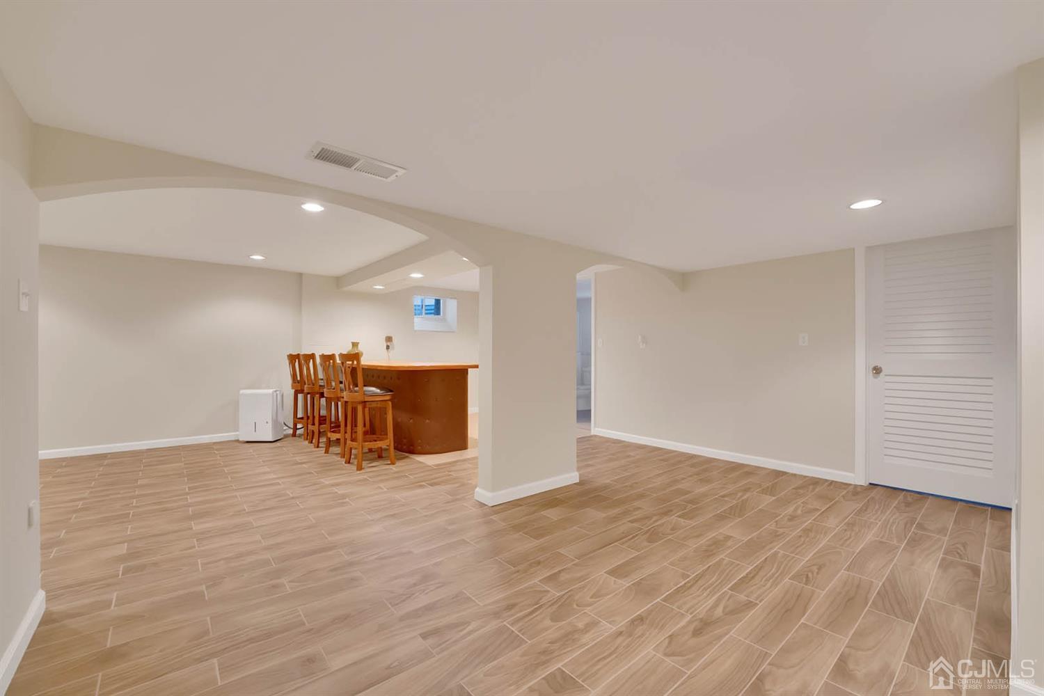 3032 Cheesequake Road Old Bridge, NJ 08859 - Photo 23 of 28 a view of a room with wooden floor