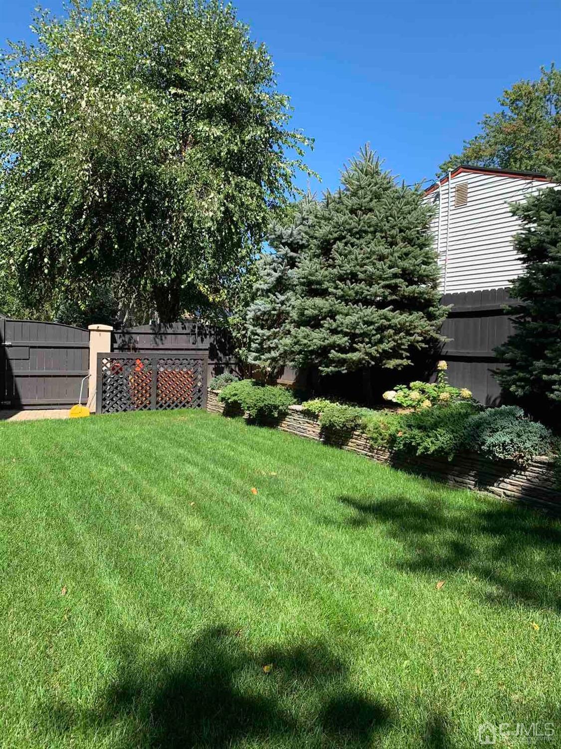 3032 Cheesequake Road Old Bridge, NJ 08859 - Photo 27 of 28 a garden view with a seating space
