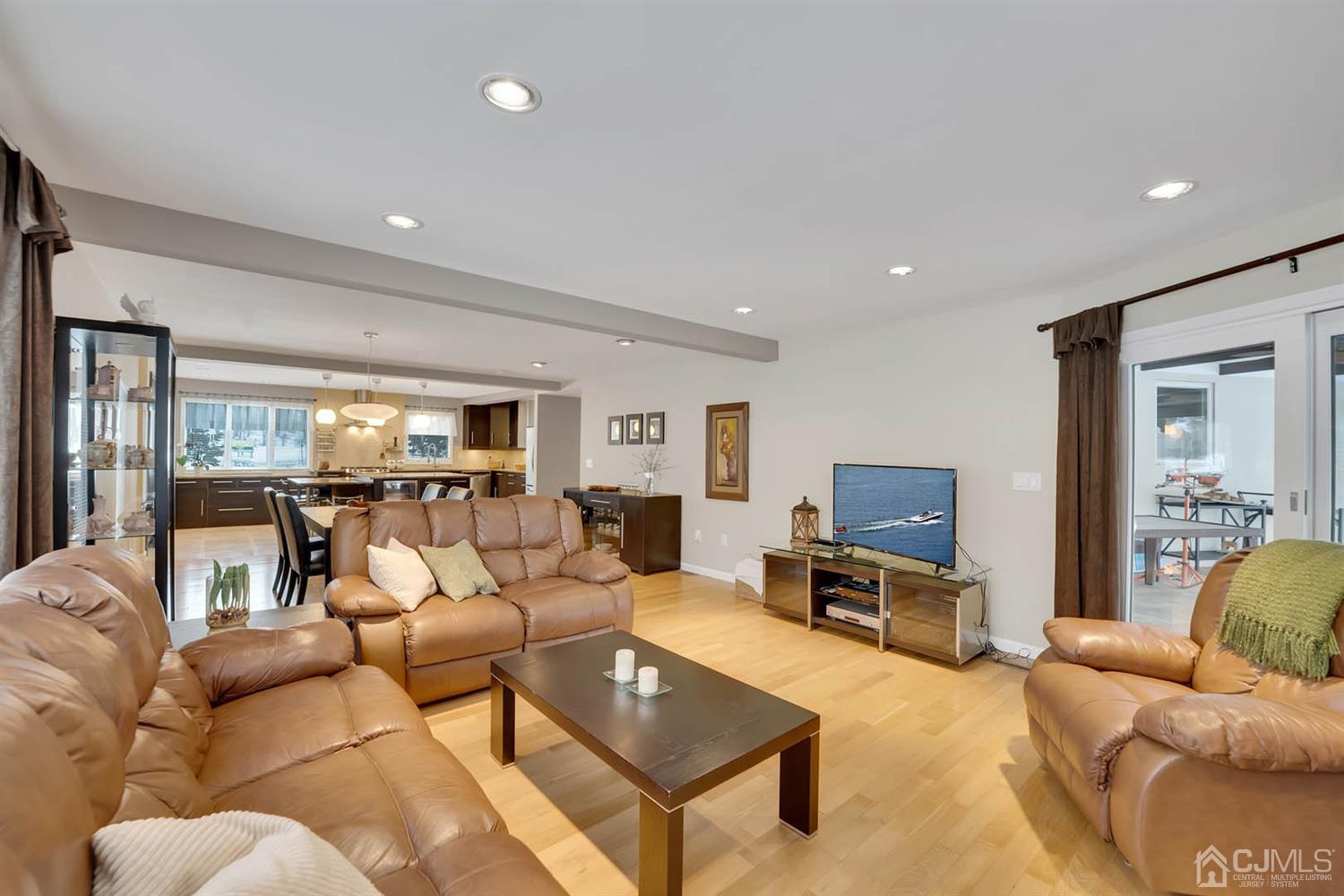 3032 Cheesequake Road Old Bridge, NJ 08859 - Photo 8 of 28 a living room with furniture and a table
