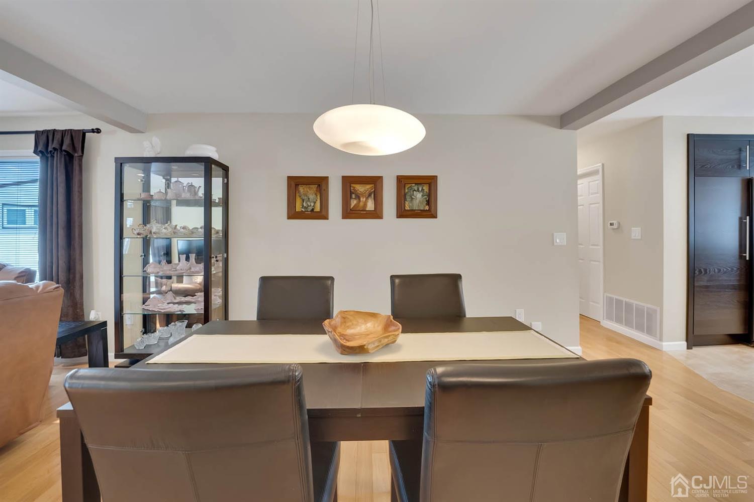 3032 Cheesequake Road Old Bridge, NJ 08859 - Photo 9 of 28 a kitchen with a table and chairs