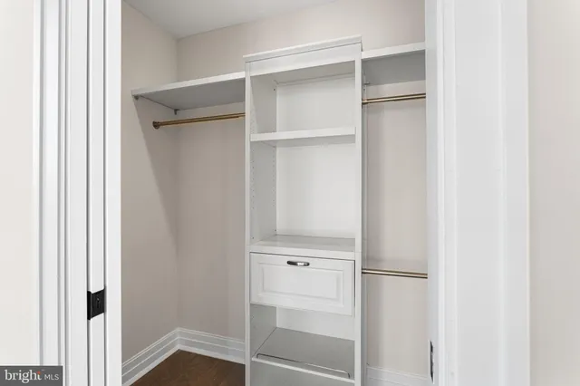 a view of an entryway with a floor to ceiling window