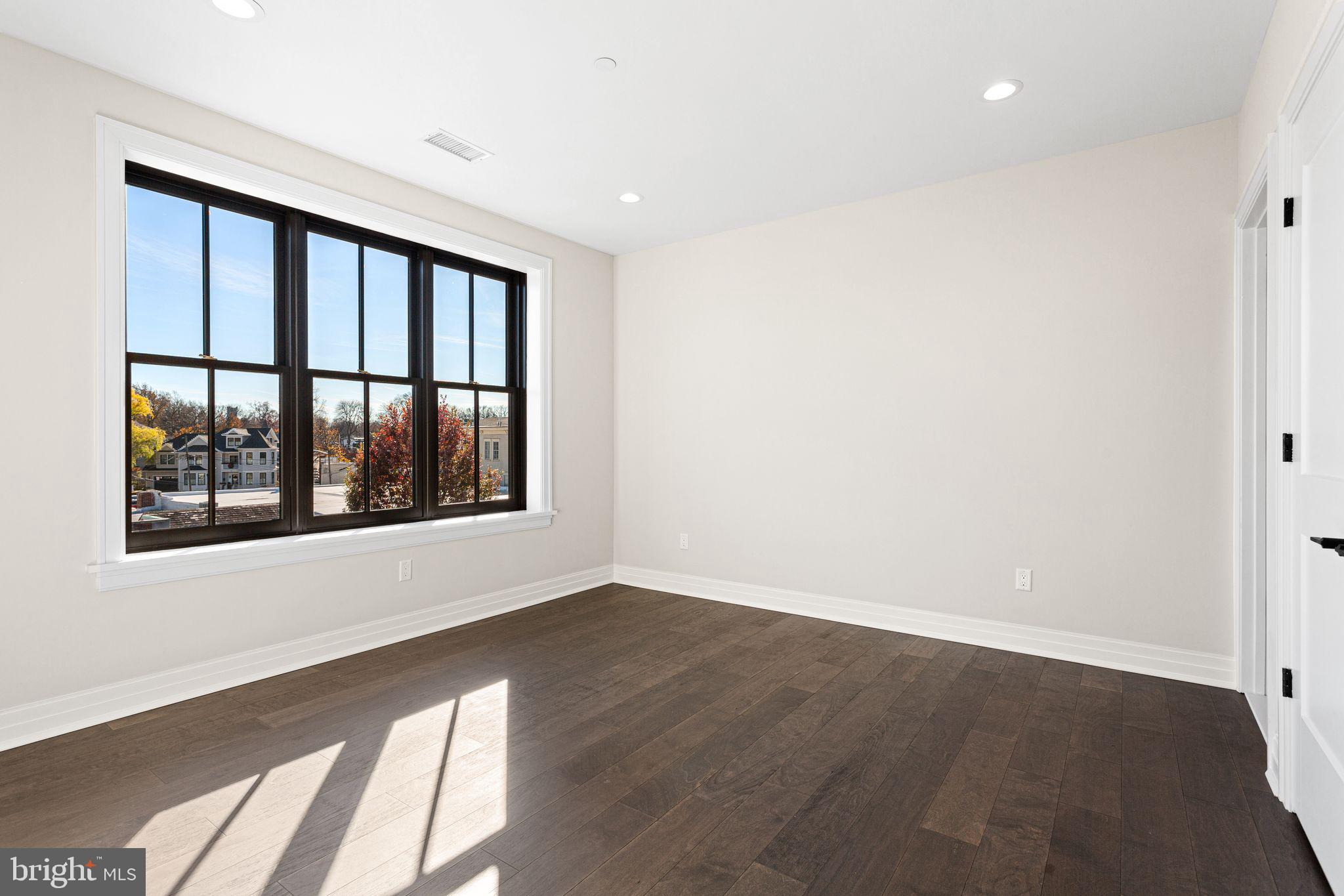 151 Kings Highway East, Unit A Haddonfield, NJ 08033 - Photo 17 of 24 a view of an empty room with a window