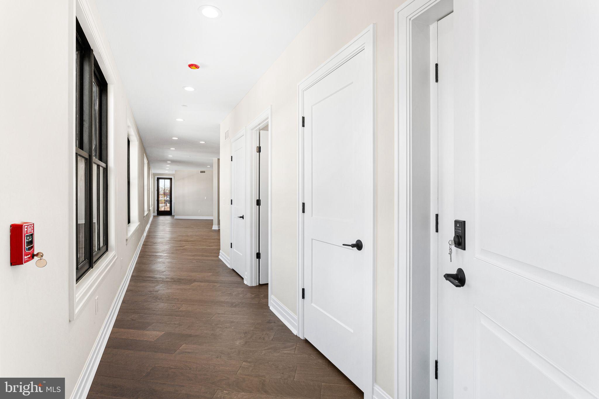 151 Kings Highway East, Unit A Haddonfield, NJ 08033 - Photo 7 of 24 a view of a hallway with wooden floor