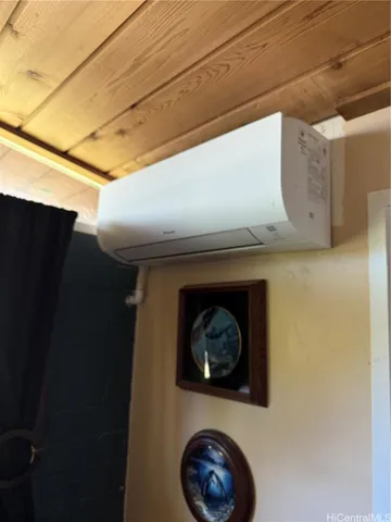 a bathroom with a sink mirror and toilet