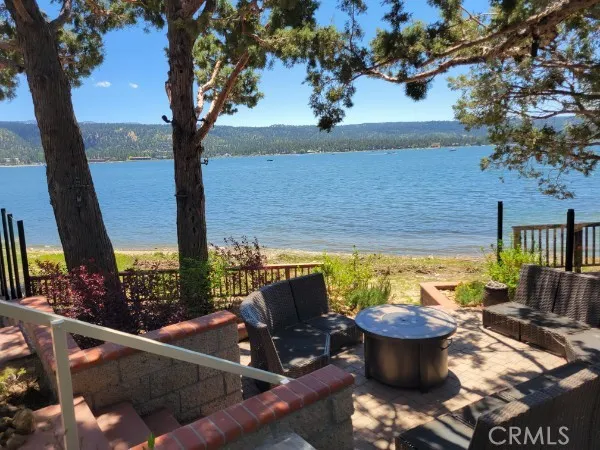 a view of swimming pool with a patio