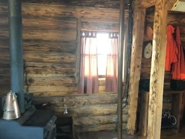 a view of a backyard with sitting area