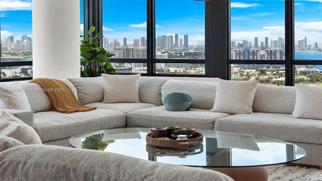 a kitchen with a refrigerator and a sink