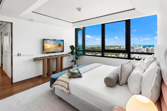 a bathroom with a bathtub and a sink