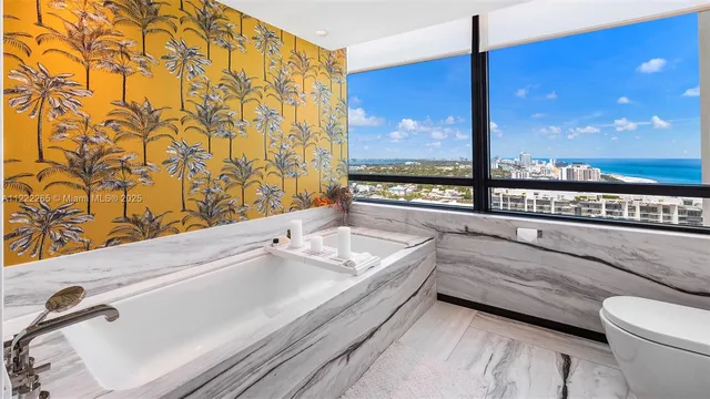 a view of a sink and a mirror