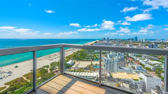 a view of a balcony with wooden floor