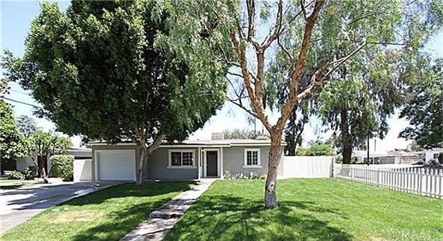 3605 Verde Street Riverside, CA 92504 - Photo 1 of 1 a front view of a house with a yard
