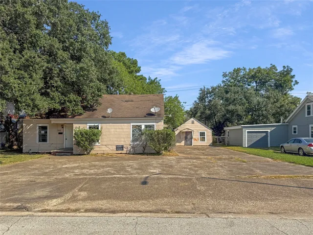 front view of a house with a patio