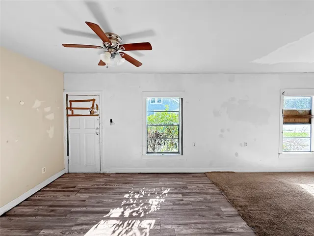a view of an empty room and window